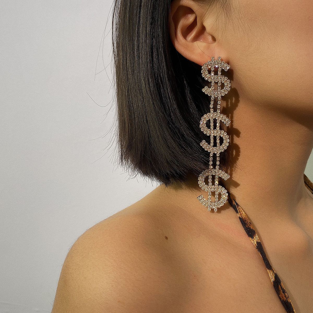 Dramatic Dollar Doll Earrings