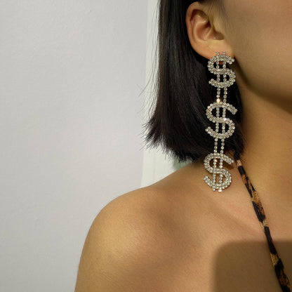 Dramatic Dollar Doll Earrings